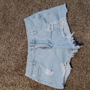 Light wash distressed jean shorts